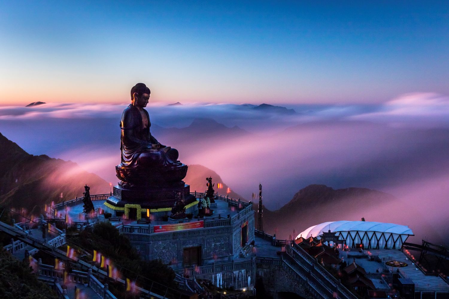  A majestic spiritual complex rising amid the sea of clouds atop Fansipan.